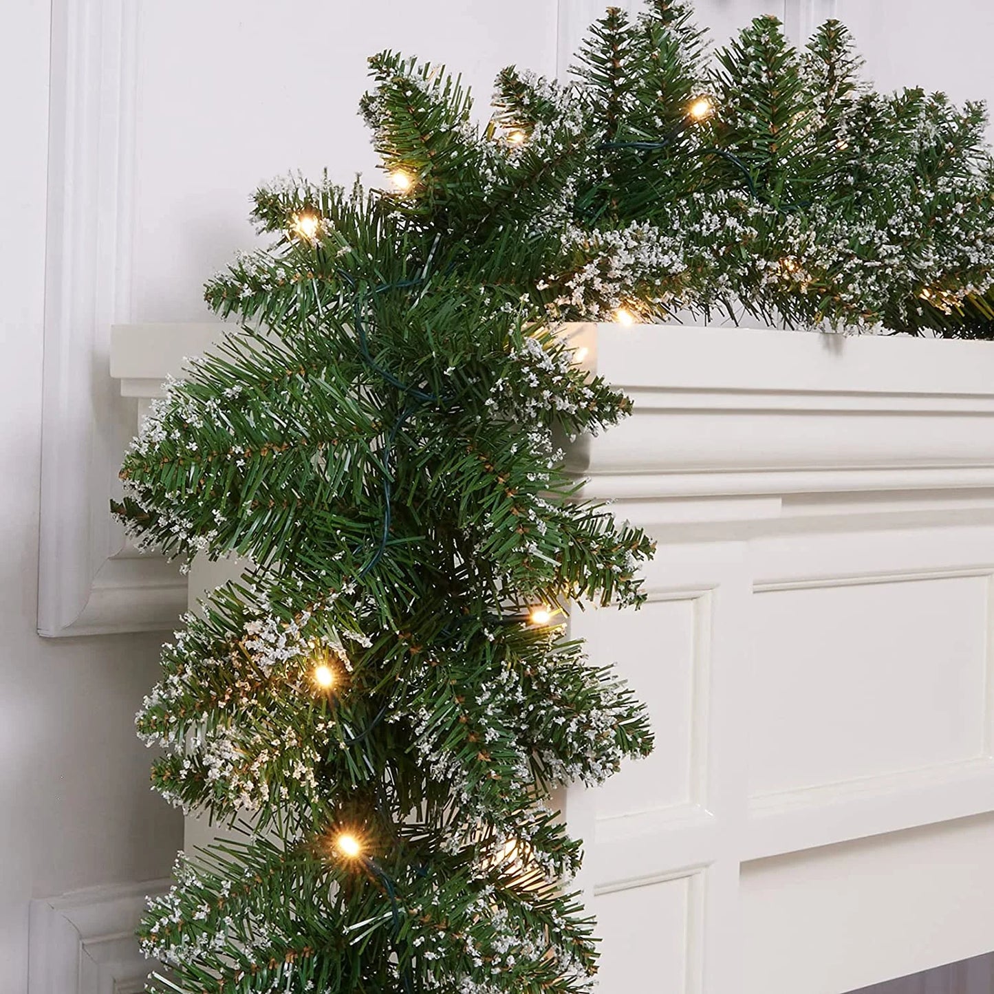 18Ft Christmas Garland with Battery Operated 50 LED Lights and Timer Snow Flocked Christmas Decorations Xmas Garland for Stairs Fireplaces Wall Door Xmas Garland