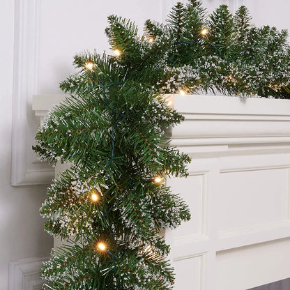 18Ft Christmas Garland with Battery Operated 50 LED Lights and Timer Snow Flocked Christmas Decorations Xmas Garland for Stairs Fireplaces Wall Door Xmas Garland